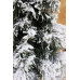 Zasnežený umelý vianočný stromček